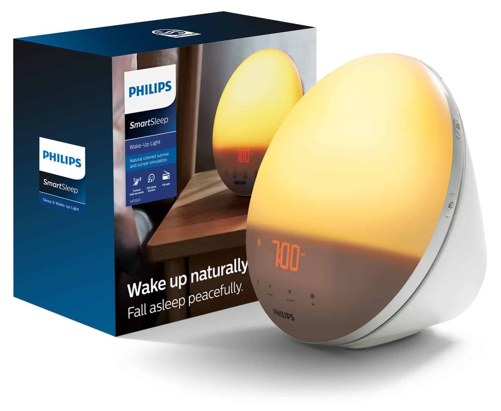 Smart sleep clock with glowing display on nightstand